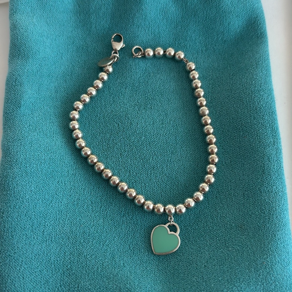 Tiffany silver beaded bracelet with blue heart